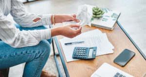 person holding receipts