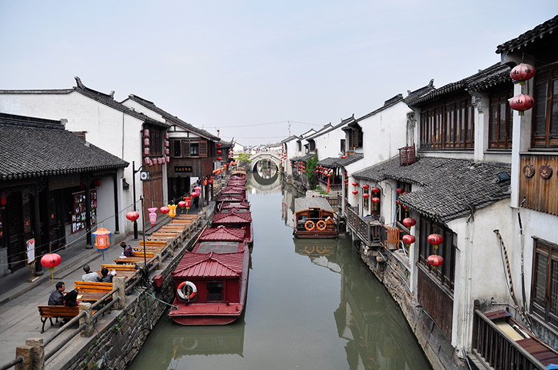 Boats in a canal in Suzhou, China