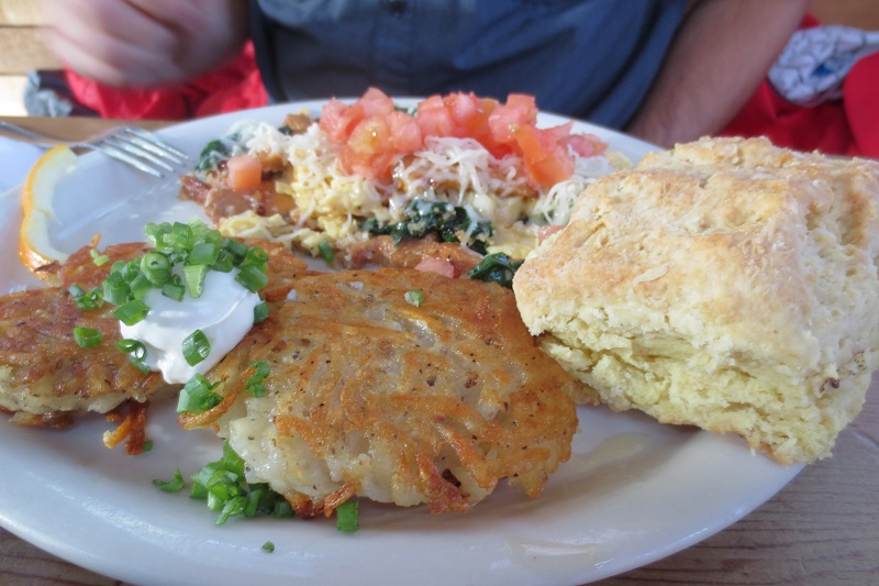 Brunch in Portland, Oregon includes biscuits, eggs and hash browns