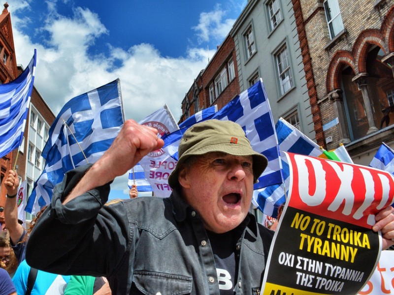 Man in Greece Protesting: Travel Advice for Greece