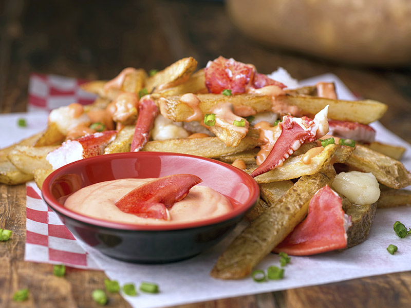 lobster poutine is one of many variations of Canadian delicacy poutine