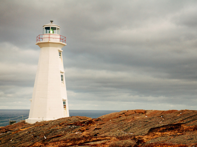 Photo of Cape Spear Lighthouse along the coast of the Atlantic Ocean in Newfoundland, Canada