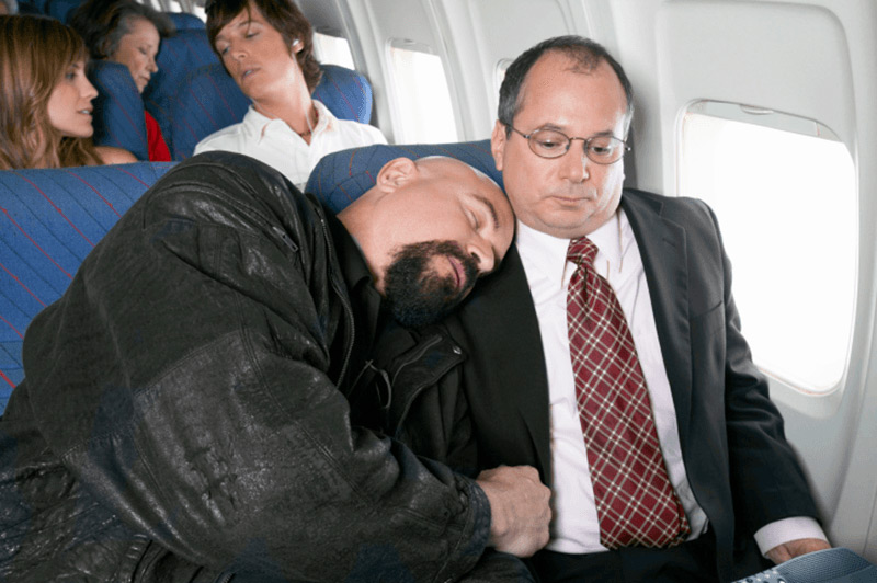 Breaking all the rules of airline etiquette, one passenger sleeps on