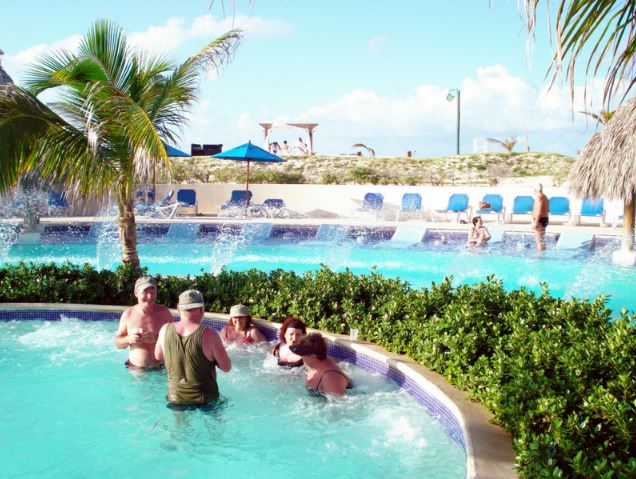 seniors relaxing in the pool