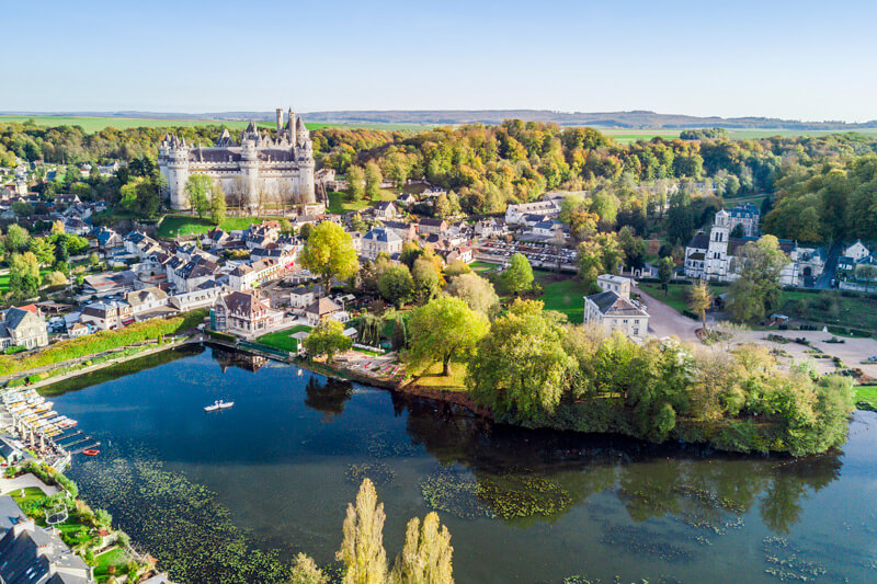 The castle of Pierrefonds dominating the village.