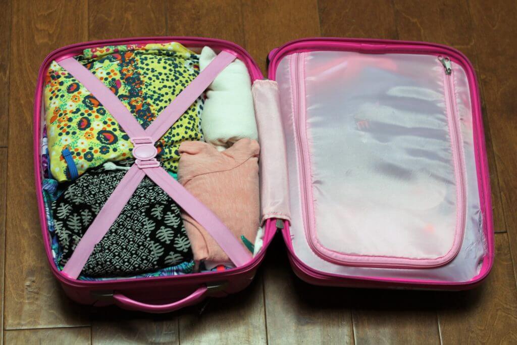 Make sure you utilize every compartment in your carry-on luggage. Rolling your clothes saves room, too!