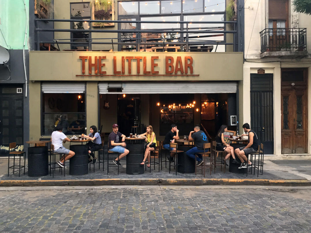 people sit at side walk café Buenos Aires