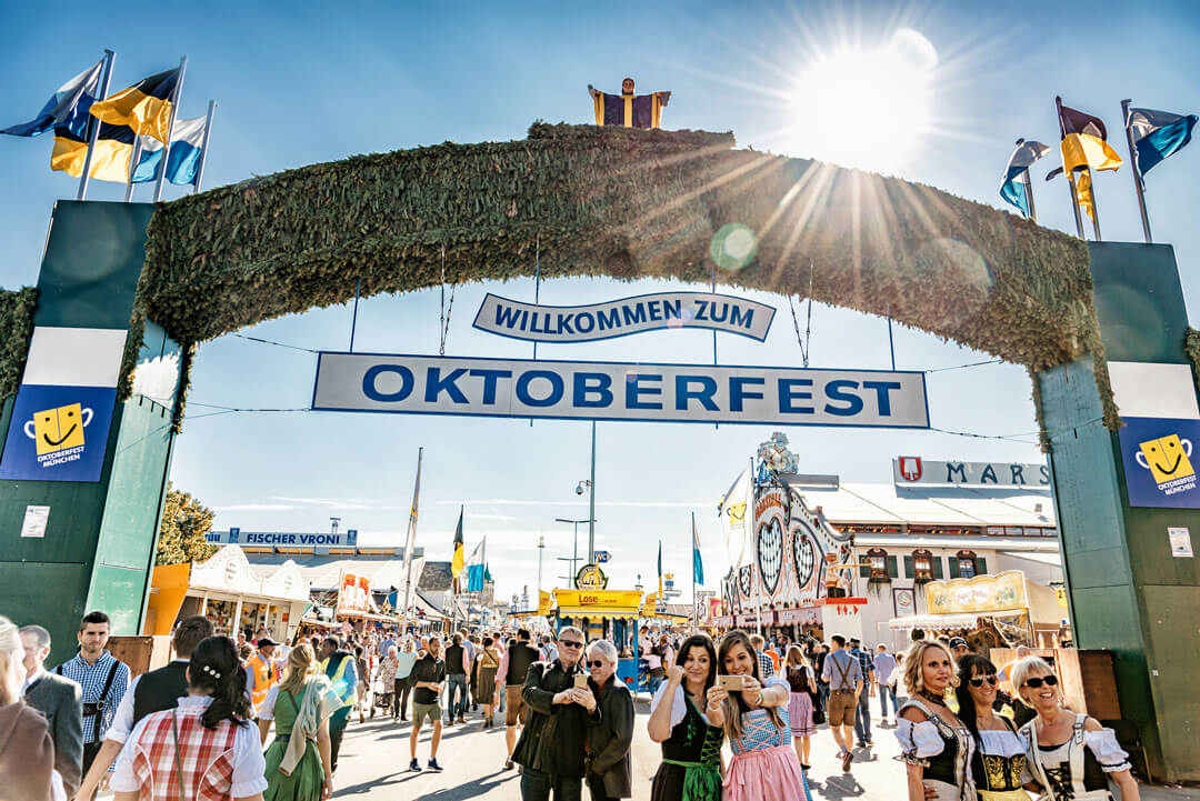 people in traditional german clothes at Oktoberfest