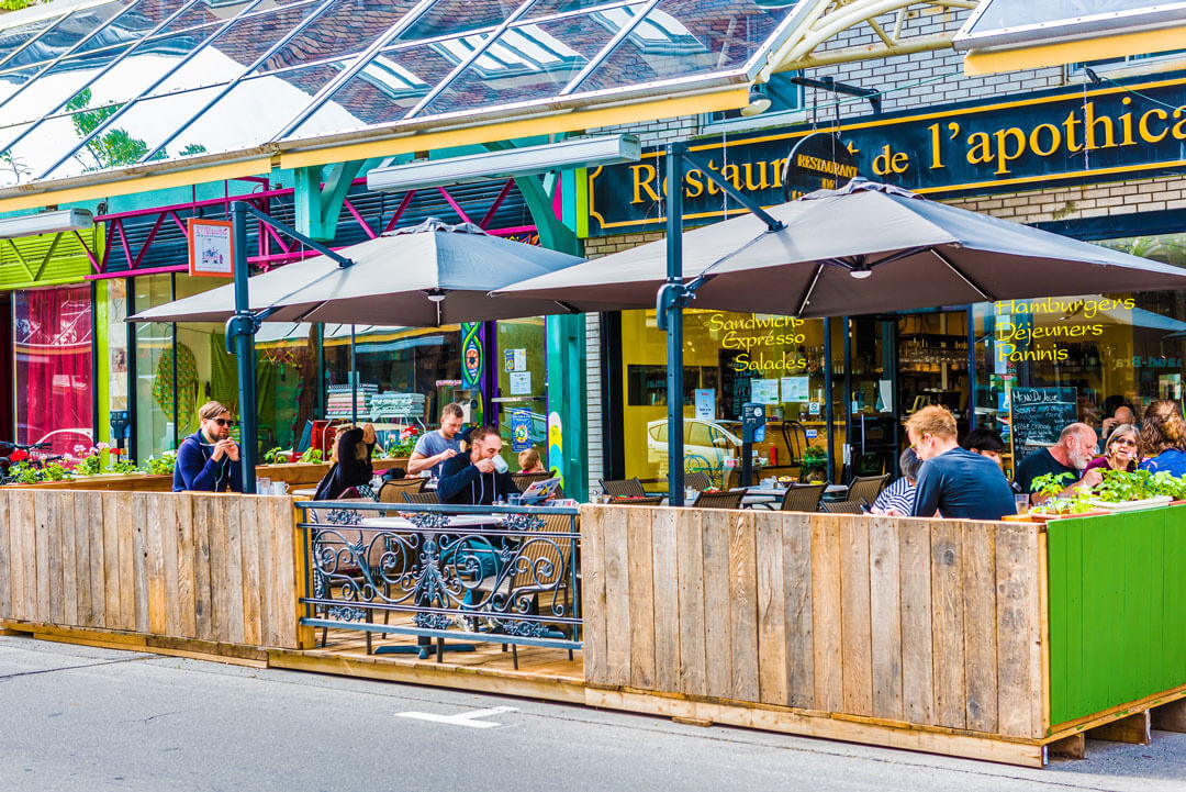 people dine at outdoor restaurant in Montreal, Canada