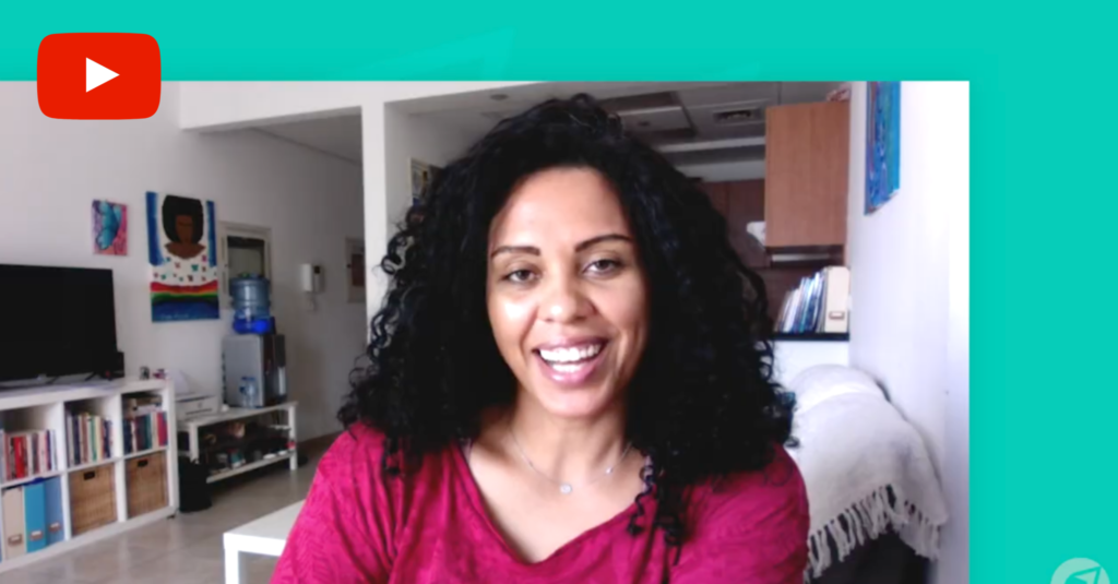 Travel in 2020 - Cover image for traveller video interview series part 1. A smiling woman faces the camera.