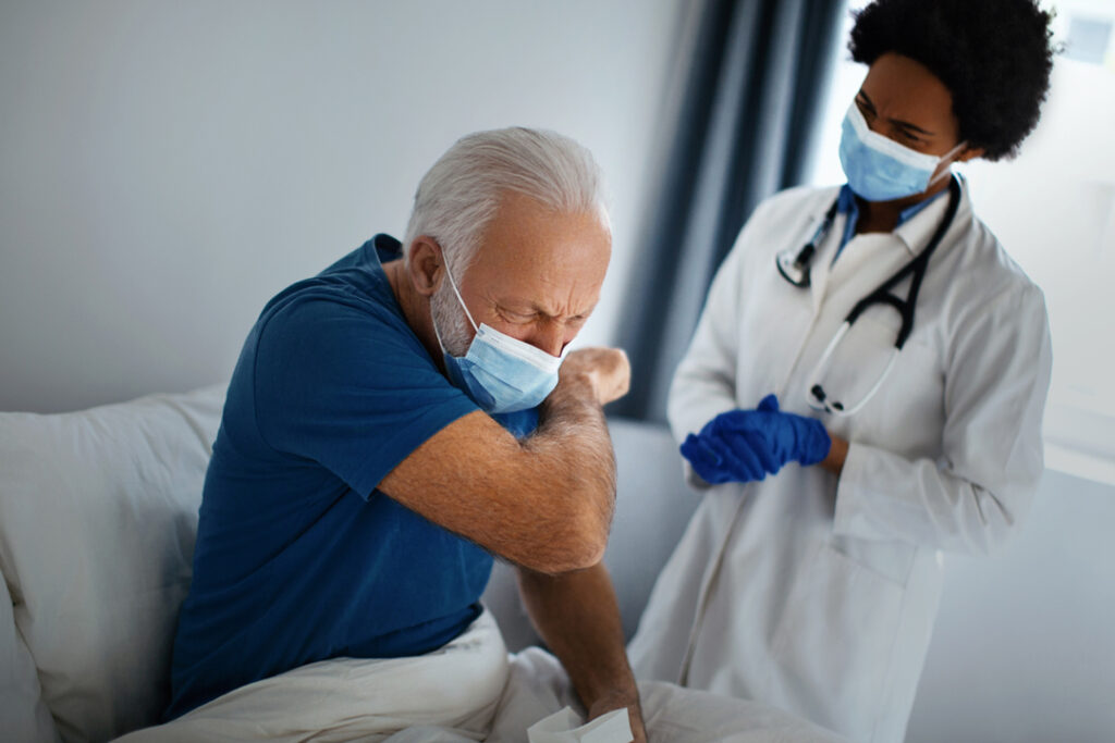 senior-coughing-covid