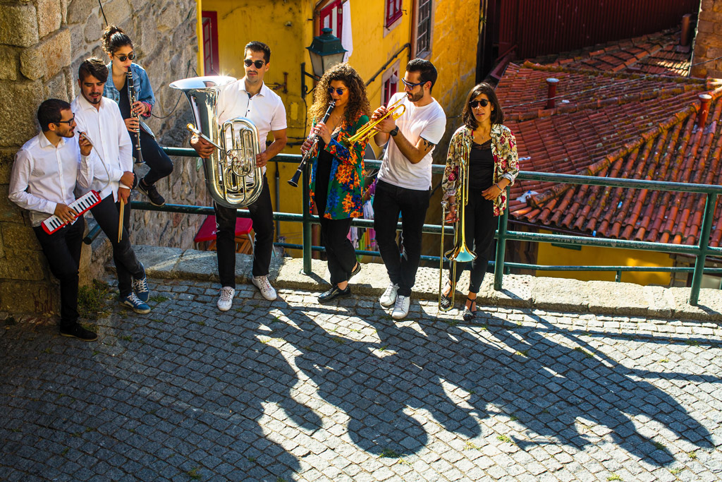Musicians play music in the street of old Porto downtown, Portugal